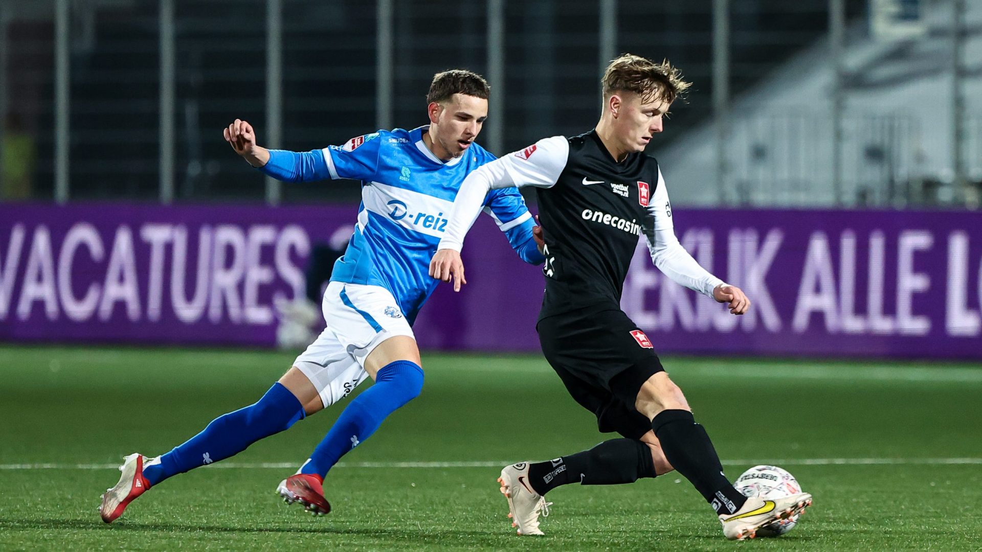 DEN BOSCH,27-01-2023,Stadium De Vliert,Dutch Football Keuken Kampioen Divisie season 2022 / 2023,MVV player Sven Blummel in action with FC Den Bosch player Tomas Kalinauskas during the match Den Bosch - MVV